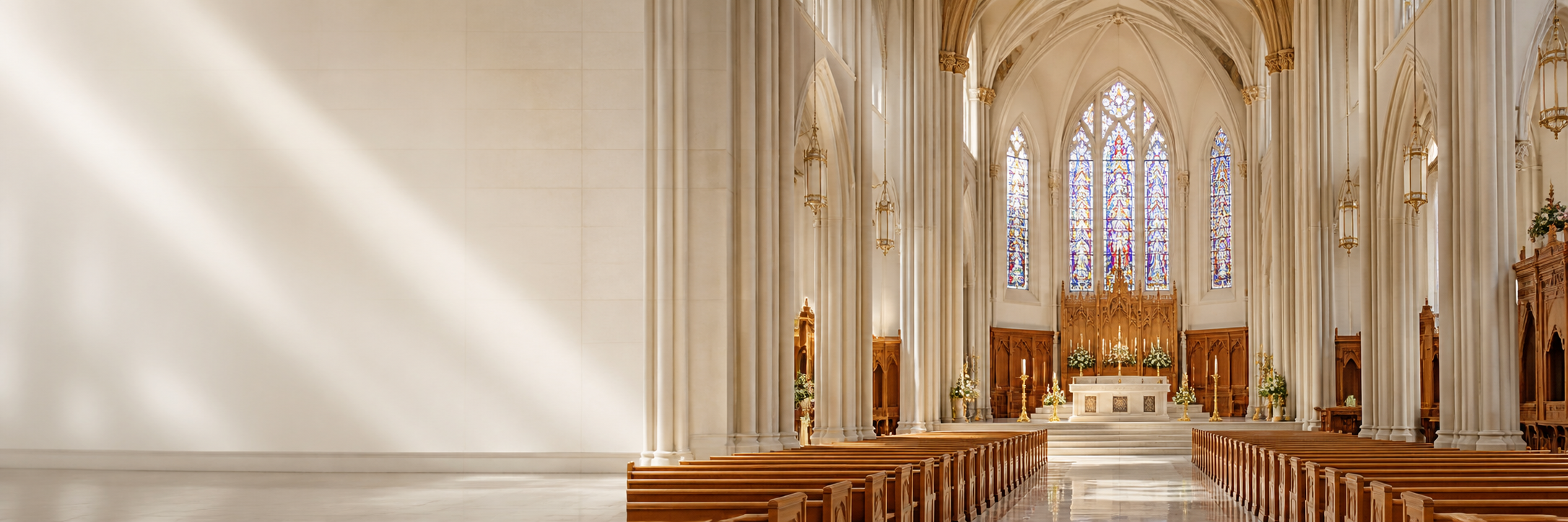 Bright cathedral interior with stained glass and altar